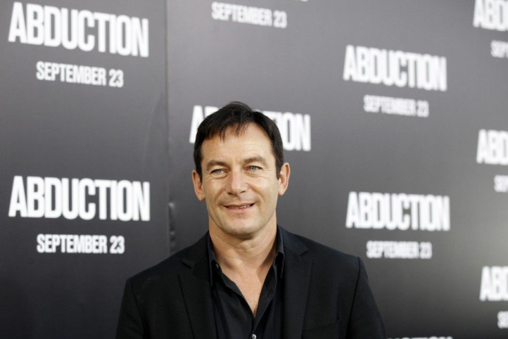 Cast member Jason Isaacs poses during the world premiere of "Abduction" at the Grauman's Chinese theatre in Hollywood, California