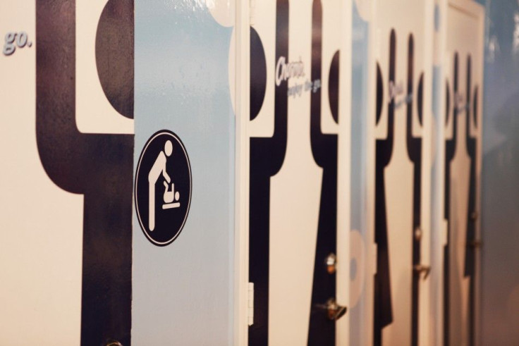 Doors to new toilets are displayed at a promotional event for Charmin Restrooms in New York&#039;s Times Square