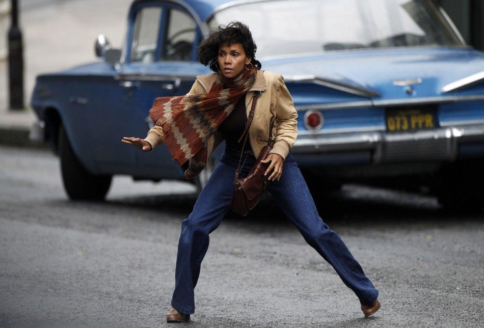 Actress Halle Berry reacts to gunfire during filming of quotCloud Atlasquot in Glasgow, Scotland 