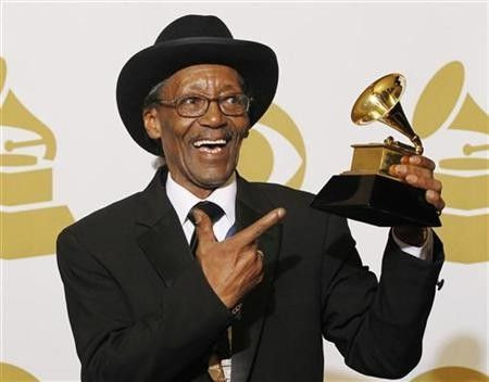 Willie 'Big Eyes' Smith poses with his award for Best Traditional Blues Album for ''Joined At The Hip'' backstage at the 53rd annual Grammy Awards in Los Angeles, California