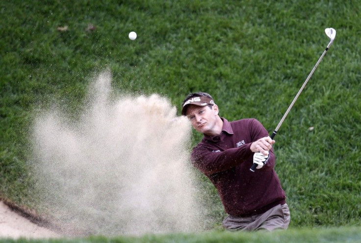Mark Wilson of the U.S. hits out of the sand trap during PGA Tour FedExCup BMW Championship golf tournament in Lemont