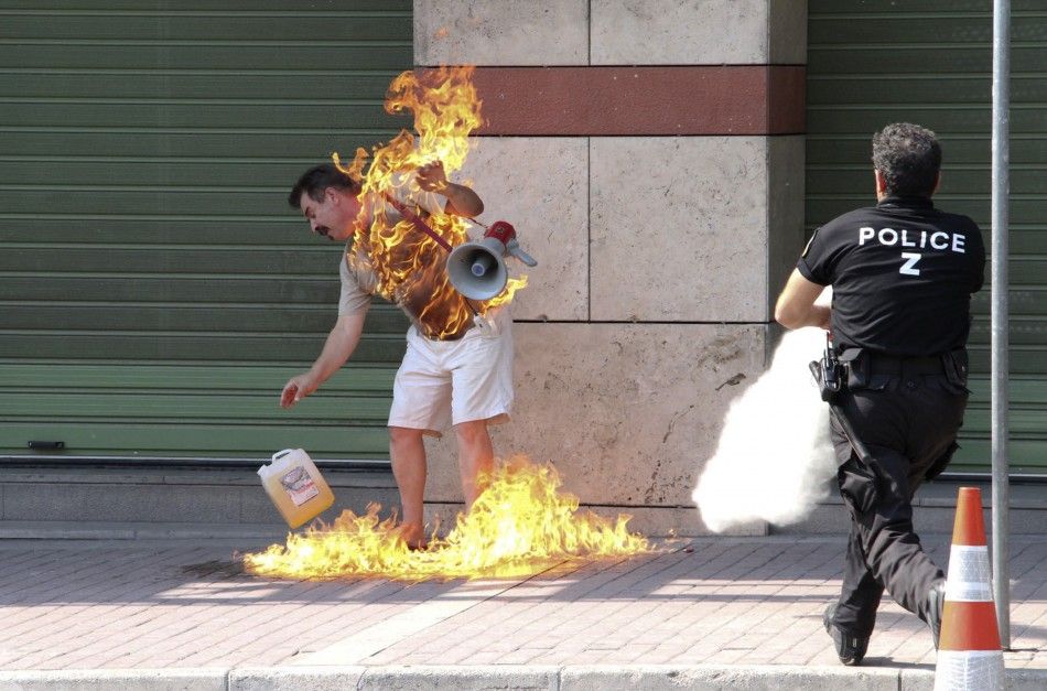 Shocking Photos of Greek Man Setting Himself on Fire