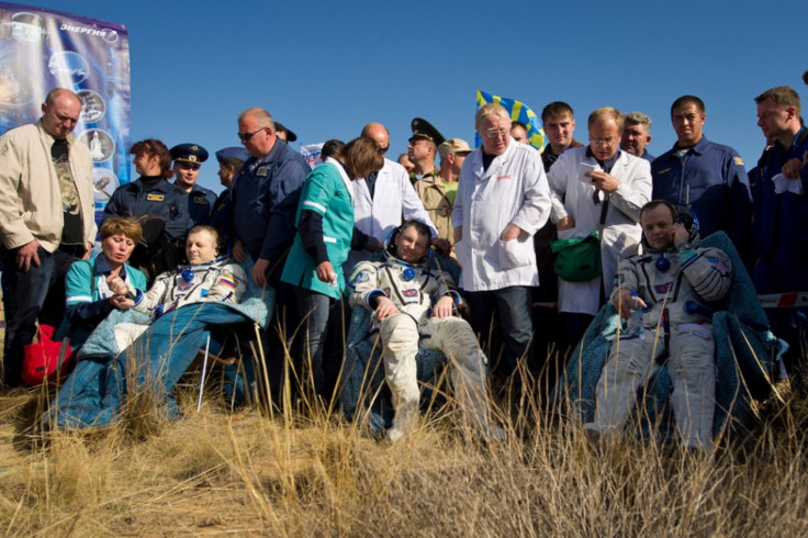 Expedition 28 Commander Andrey Borisenko, left, Flight Engineers Alexander Samokutyaev, center, and Ron Garan