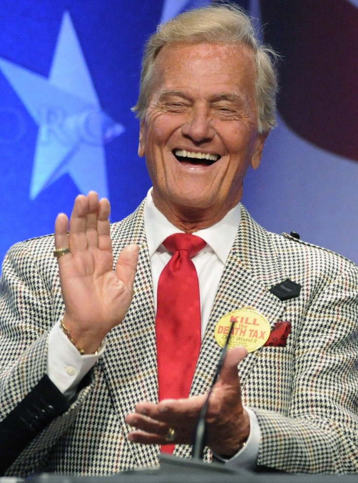 Entertainer Pat Boone laughs as he accepts a lifetime achievement award at the Conservative Political Action conference in Washington