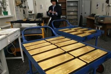 Trays with gold ingots are placed in a room for final weighing and packaging at the Krastsvetmet plant in the Siberian city of Krasnoyarsk