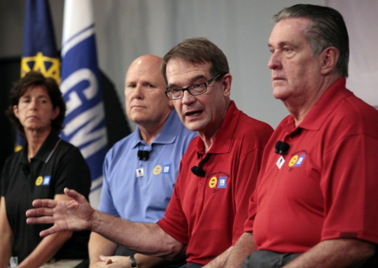 United Auto Workers Union President Bob King addresses media as GM Chairman and CEO Akerson, GM VP of Labor Relations Clegg and UAW VP UAW-GM department Ashton listen at Detroit-Hamtramck assembly plant