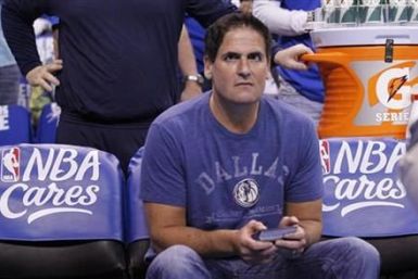 Mavericks owner Mark Cuban watches the action against the Thunder during Game 3 of the NBA Western Conference Final basketball playoff in Oklahoma City