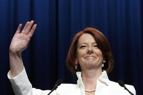 Australian Prime Minister Julia Gillard waves to supporters at the Labor Party election headquarters in Melbourne