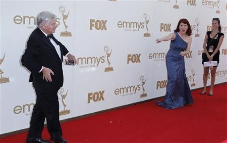 Actor Robert Morse (L) from television series &#039;&#039;Mad Men&#039;&#039; and actress Kate Flannery (C) from television series &#039;&#039;The Office&#039;&#039; arrive at the 63rd Primetime Emmy Awards in Los Angeles