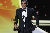 Actor Ty Burrell from television series &quot;Modern Family&quot; accepts the award for outstanding supporting actor in a comedy series, at the 63rd Primetime Emmy Awards in Los Angeles September 18, 2011.