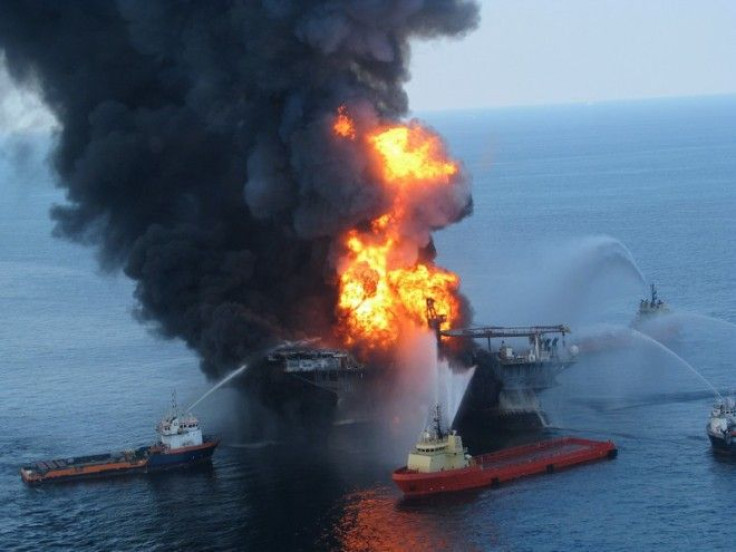 Fire boat response crews battle the blazing remnants of the offshore oil rig Deepwater Horizon, off Louisiana, in this handout photograph taken on April 21, 2010 and obtained on April 22. 