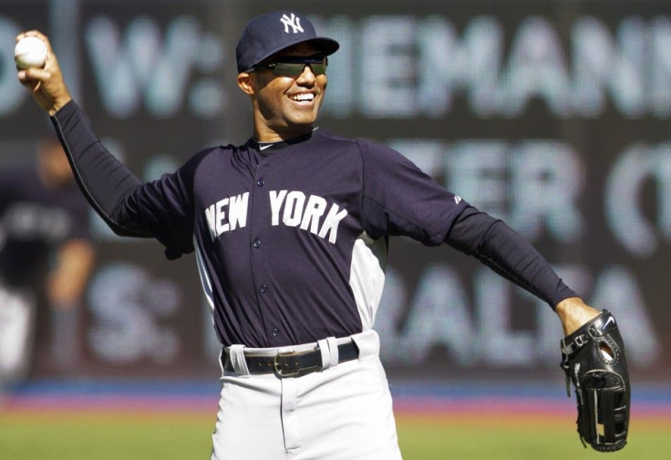 Yankees closer Rivera throws during warm-ups before his team plays the Toronto Blue Jays during their MLB baseball game in Toronto