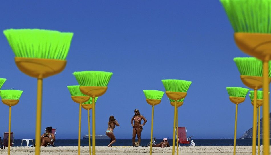 Brazilians Urge to Sweep off Corruption by Placing Brooms at a Beach