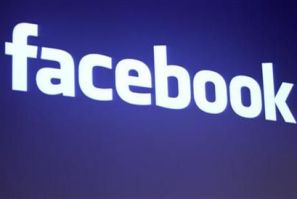 The Facebook logo is shown at Facebook headquarters in Palo Alto