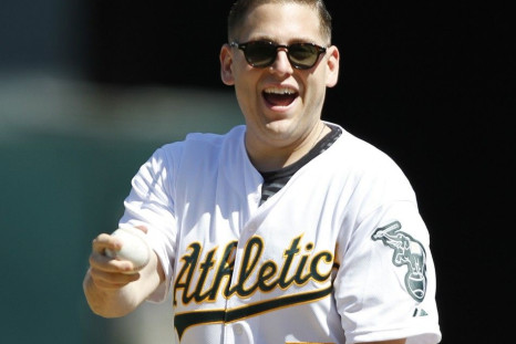 Actor Jonah Hill prepares to throw out the first pitch before the Oakland Athletics and Detroit Tigers MLB American League baseball game in Oakland, California