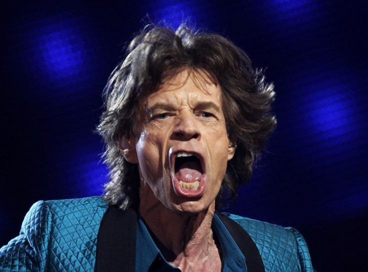 Mick Jagger performs "Everybody Needs Someone to Love"at the 53rd annual Grammy Awards in Los Angeles