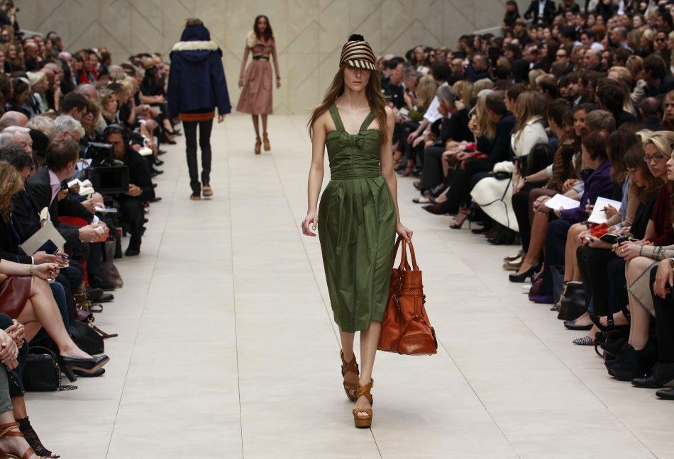 Models present creations from the Burberry Prorsum 2012 SpringSummer collection during London Fashion Week