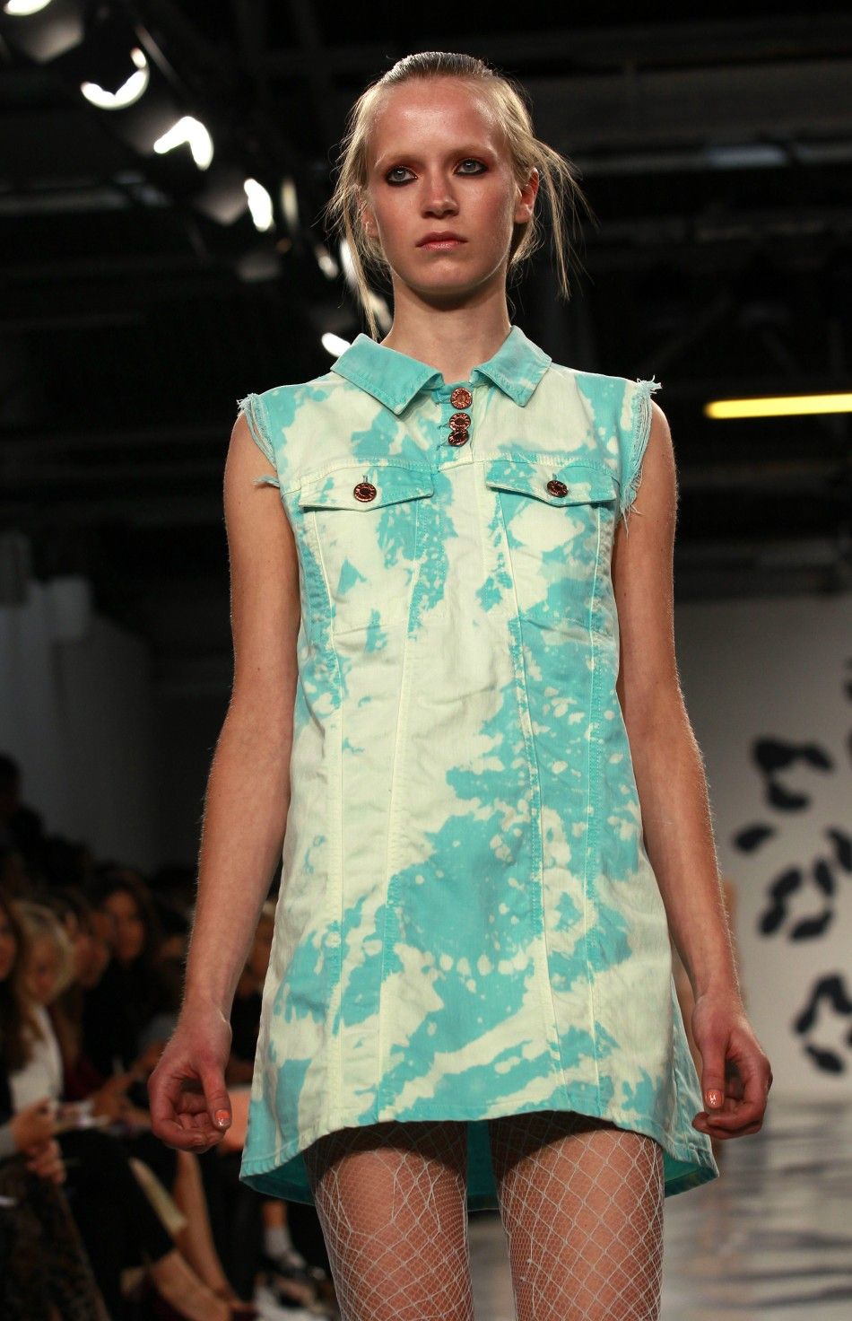A model presents a creation at the House of Holland 2012 SpringSummer collection during London Fashion Week