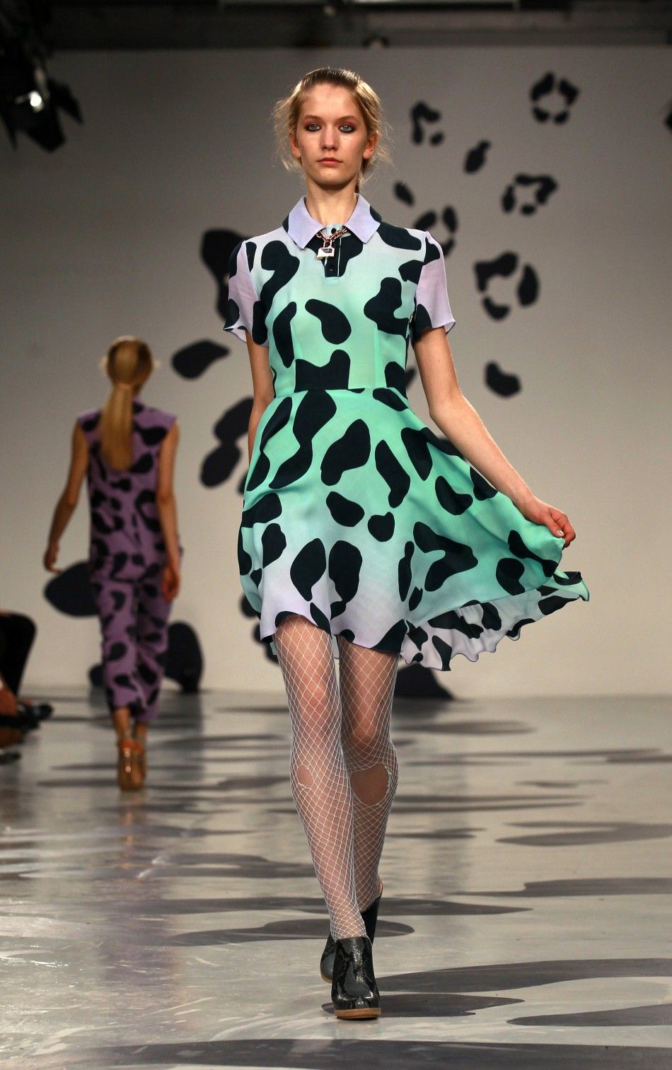 Models present creations at the House of Holland 2012 SpringSummer collection during London Fashion Week