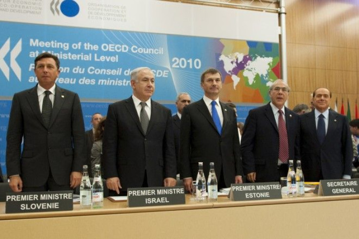 OECD Secretary General Gurria stands with prime minsters from Slovenia, Israel, Estonia, and Italy in this file photo.