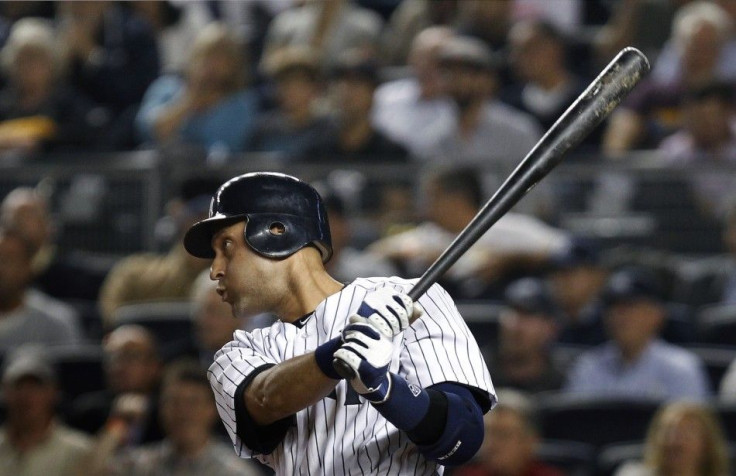 Yankees&#039; Jeter singles in eighth inning against Rays in their MLB American League baseball game in New York