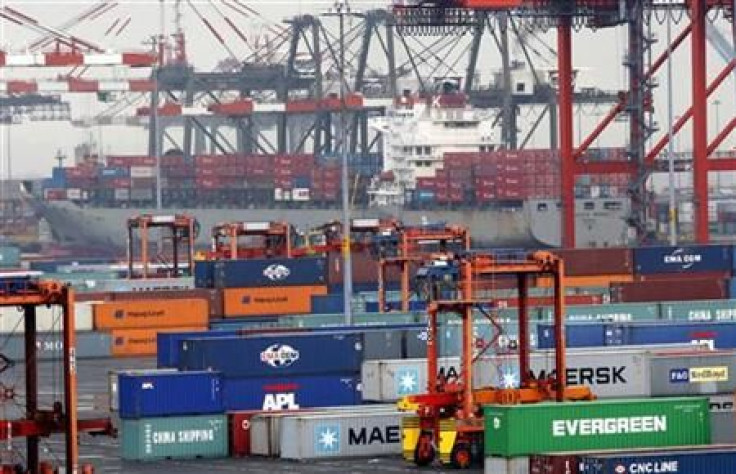 Shipping containers are seen at the Port Newark Container Terminal near New York City as government reported lowest trade gap since 1999