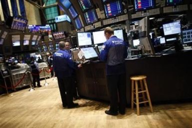 Traders work on the floor of the New York Stock Exchange (NYSE)