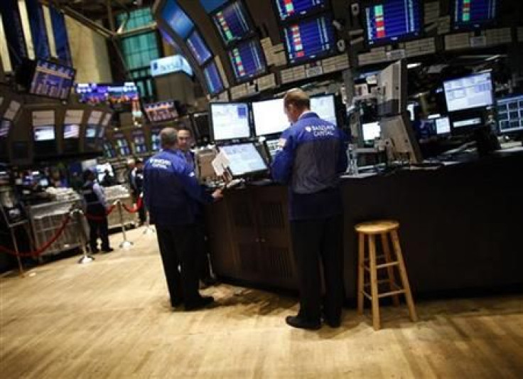 Traders work on the floor of the New York Stock Exchange (NYSE)