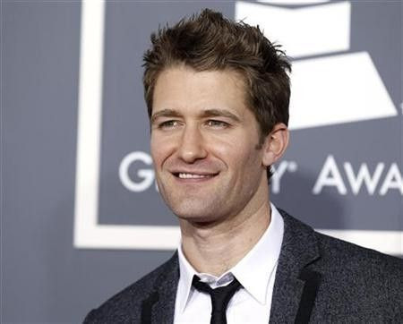 Matthew Morrison from the television show "Glee" poses on arrival at the 53rd annual Grammy Awards in Los Angeles, California