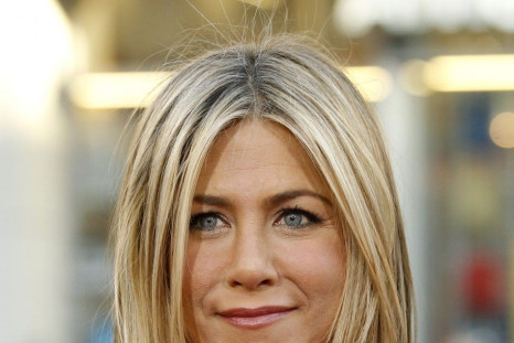 Jennifer Aniston poses at the premiere of Horrible Bosses at the Grauman's Chinese theatre in Hollywood