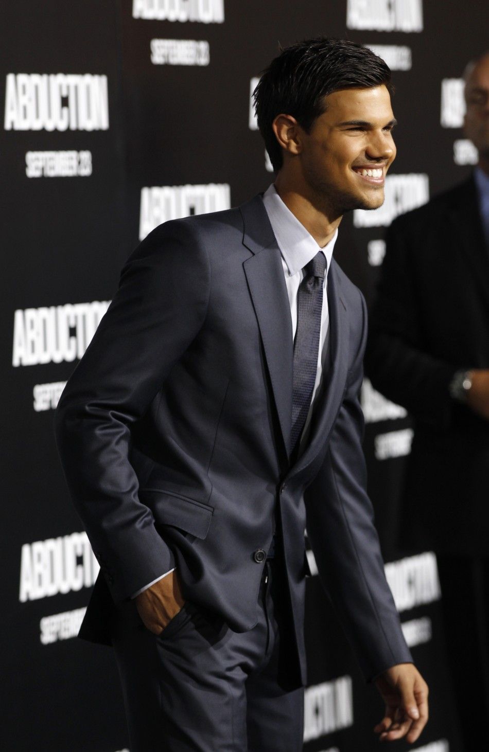 Lautner poses during the world premiere of quotAbductionquot in Hollywood