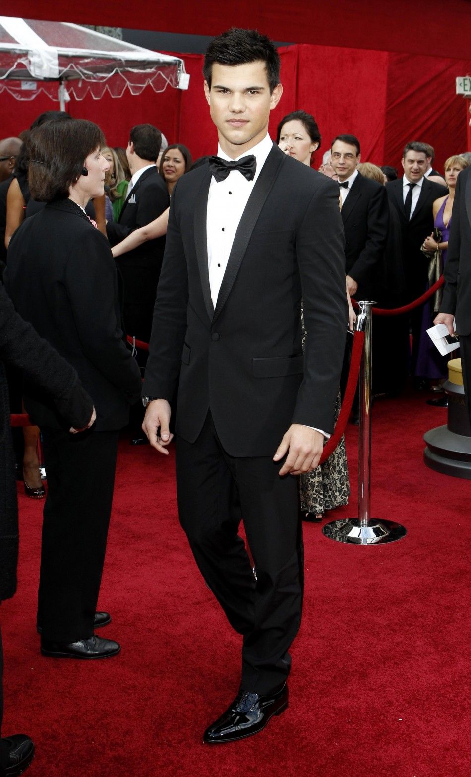 Taylor Lautner arrives at the 82nd Academy Awards in Hollywood