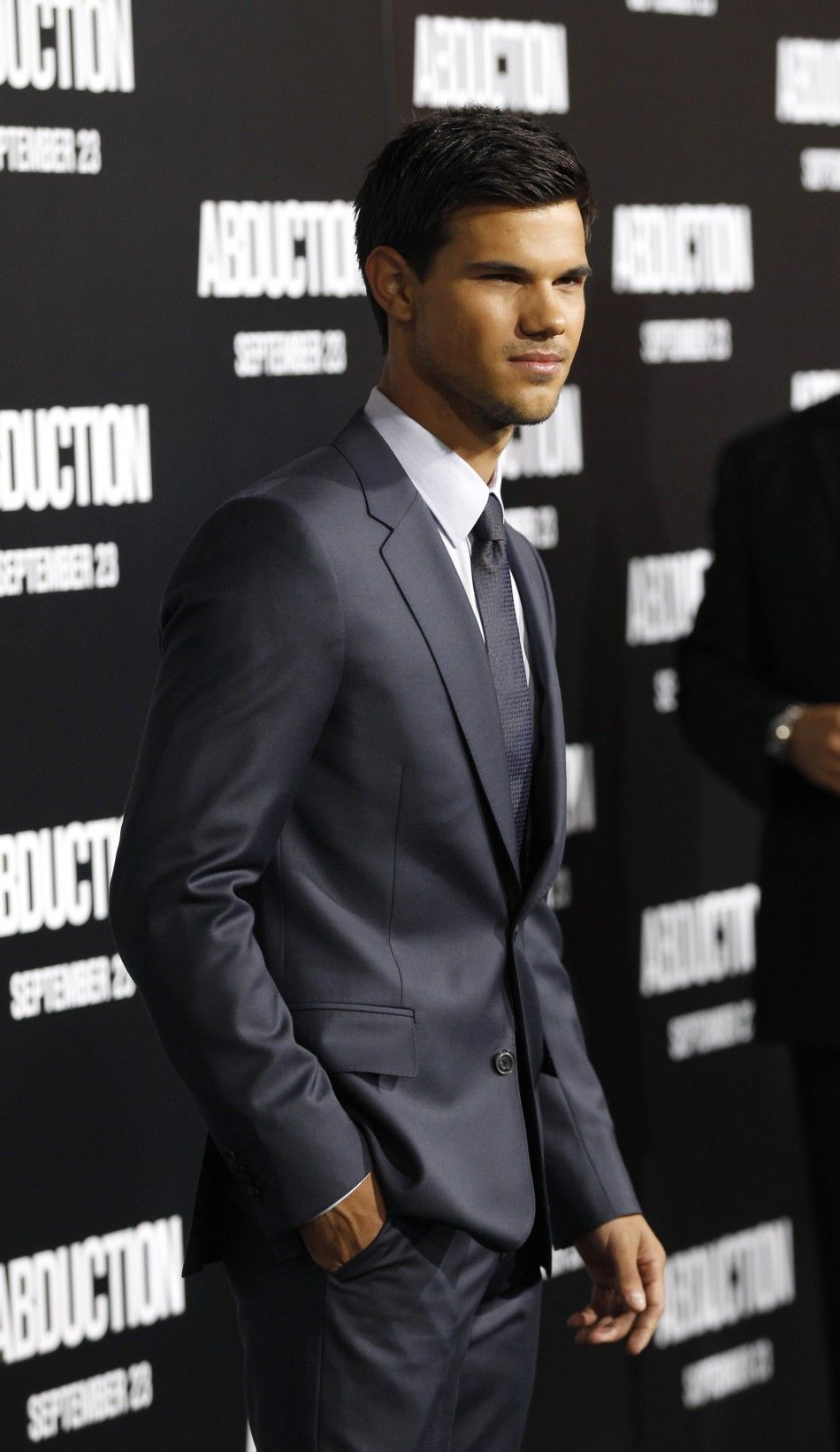 Taylor Lautner poses during the world premiere of quotAbductionquot in Hollywood