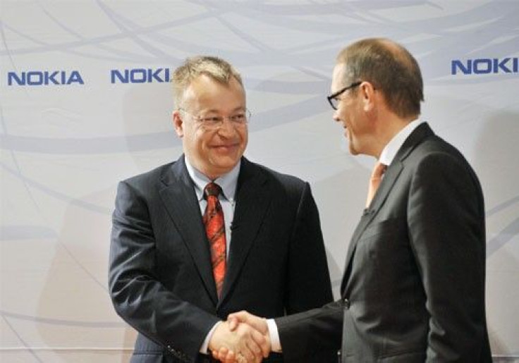 Nokia's new Chief Executive Stephen Elop (L) shakes hands with Nokia's Chairman of the Board Jorma Ollila during a news conference in Espoo Finland, September 10, 2010