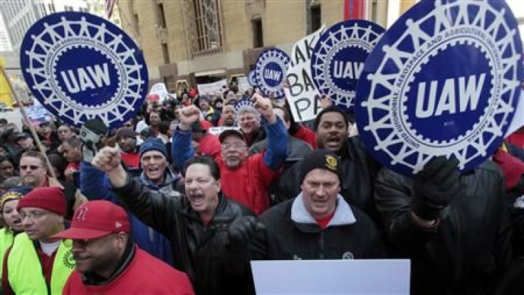United Auto Workers convention delegates chant during a rally for good jobs and tax reform following a UAW convention in Detroit, Michigan, in this March 24, 2011 file photo.