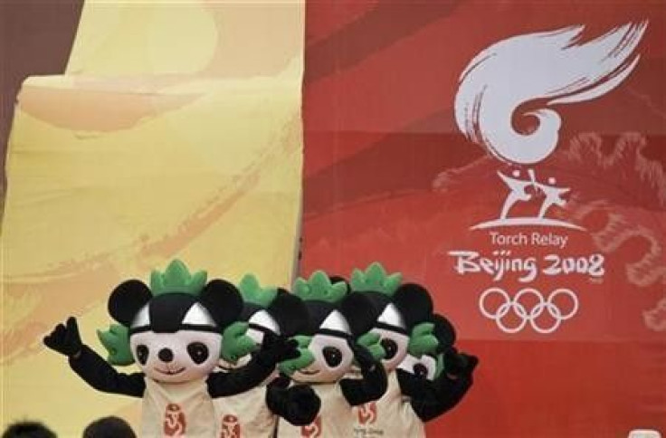 Actors dressed as Olympic &#039;&#039;Fuwa&#039;&#039; mascots perform during a ceremony for the 2008 Beijing Olympic torch relay in Beijing