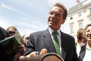 Former Governor of California Arnold Schwarzenegger shakes hands with fans at Ballhausplatz in Vienna
