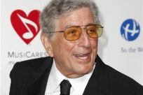 Singer Tony Bennett arrives at the 2011 MusiCares Person of the Year tribute honoring Barbra Streisand in Los Angeles