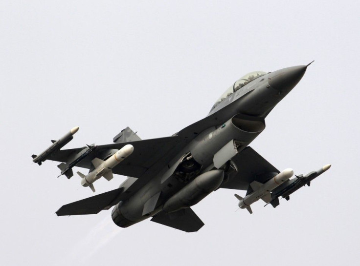 A F-16 fighter jet takes off on a highway used as an emergency landing strip during the Han Kuang military exercise in Madou