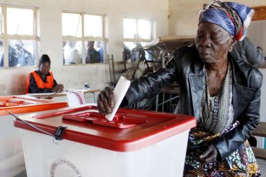 Mary Kapela casts her vote during the presidential election in Zambia at Chibolya Basic School