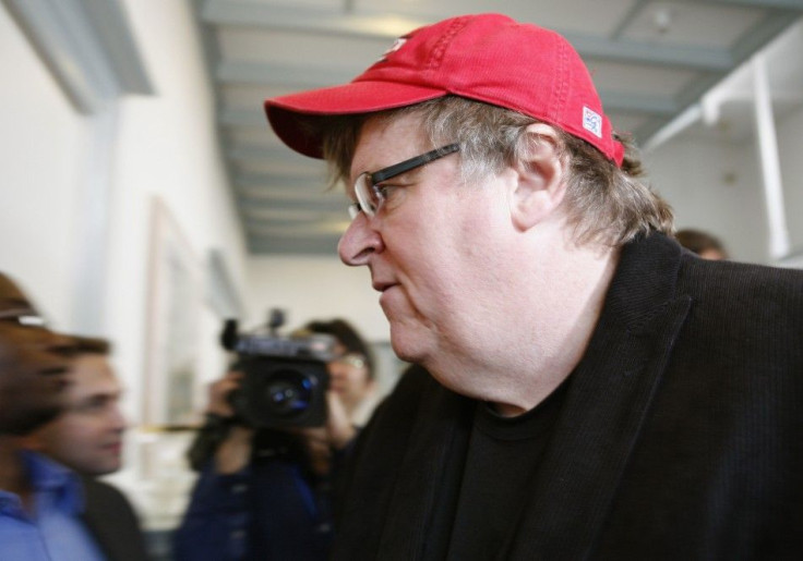 Michael Moore speaks at a news conference in Washington