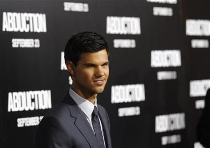 Cast member Taylor Lautner poses at the world premiere of ''Abduction'' at the Grauman's Chinese theatre in Hollywood, California September 15, 2011. The movie opens in the U.S.