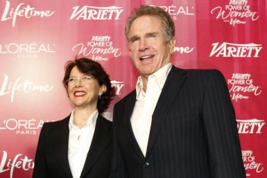 Actress and honoree Annette Bening and her husband actor Warren Beatty pose at the Variety's 3rd Annual Power of Women luncheon in Beverly Hills, California 