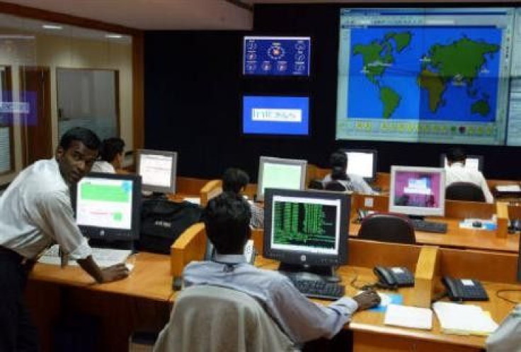 Engineers work in the control room at Infosys Technologies campus in Bangalore