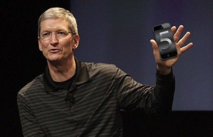 Tim Cook with the iPhone