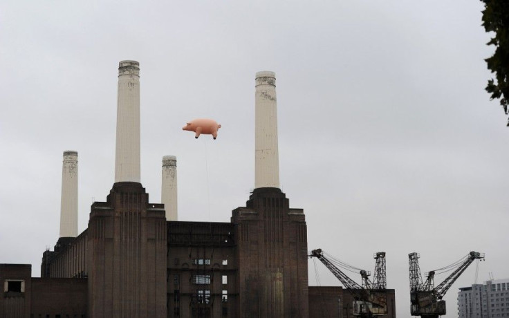 An inflatable pink pig flies above Battersea Power Station in London