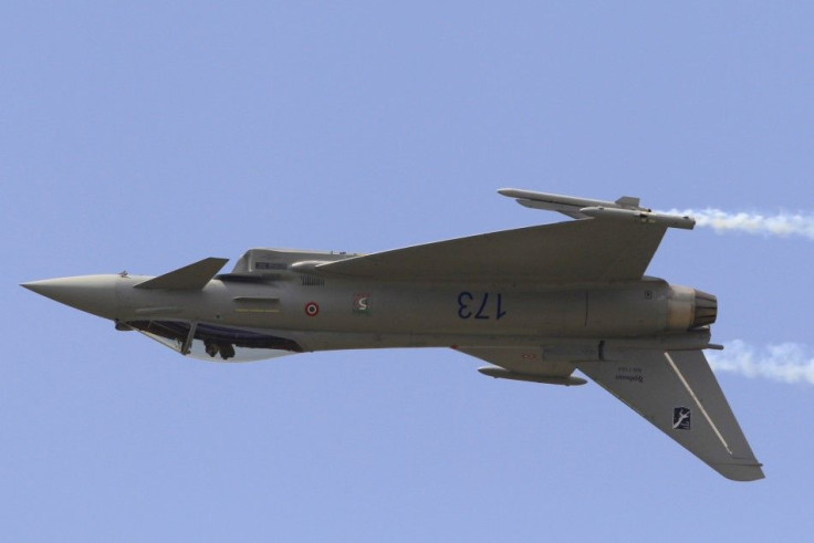 An Eurofighter Typhoon fighter jet takes part in a flying display during the 49th Paris Air Show at the Le Bourget airport