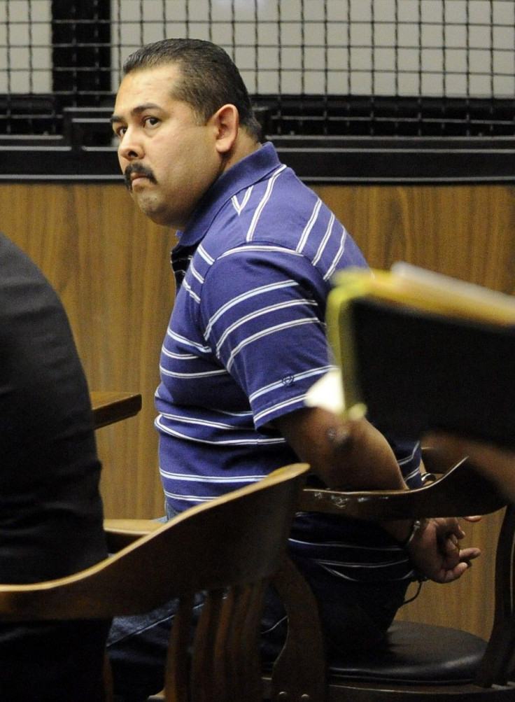 Fullerton police officer Manuel Ramos sits during his arraignment at a courtroom in Santa Ana, California.