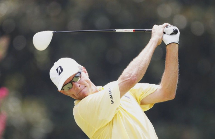 Davis Love III of the U.S. tees off on the third hole during the third round of the 93rd PGA Championship golf tournament at the Atlanta Athletic Club in Johns Creek