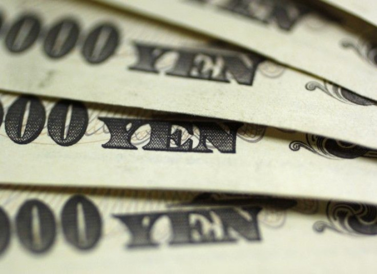 Japanese 10,000 yen notes are spread out at Interbank Inc. money exchange in Tokyo